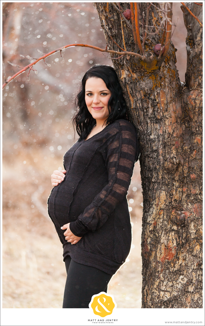 Reno Family Photographer Maternity Photography in Reno, NV with snow in background snowing lightly
