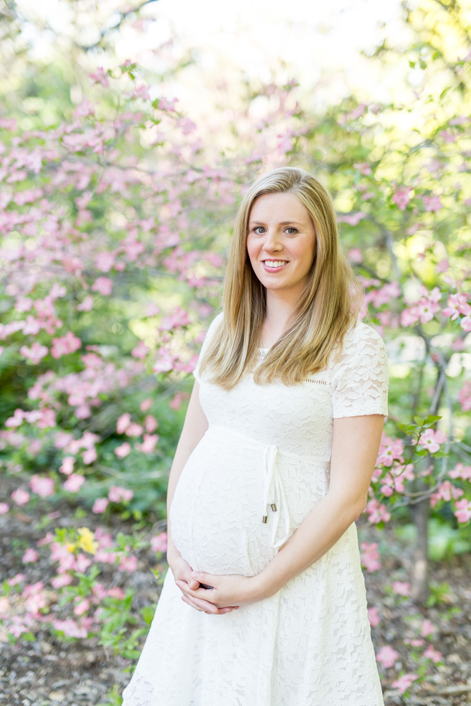 Maternity portrait of woman in white lace dress at Rancho San Rafael by Reno Maternity Photographer