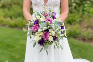 Bride shows her gorgeous wedding bouquet for her Edgewood Wedding by Lake Tahoe Wedding Photographer