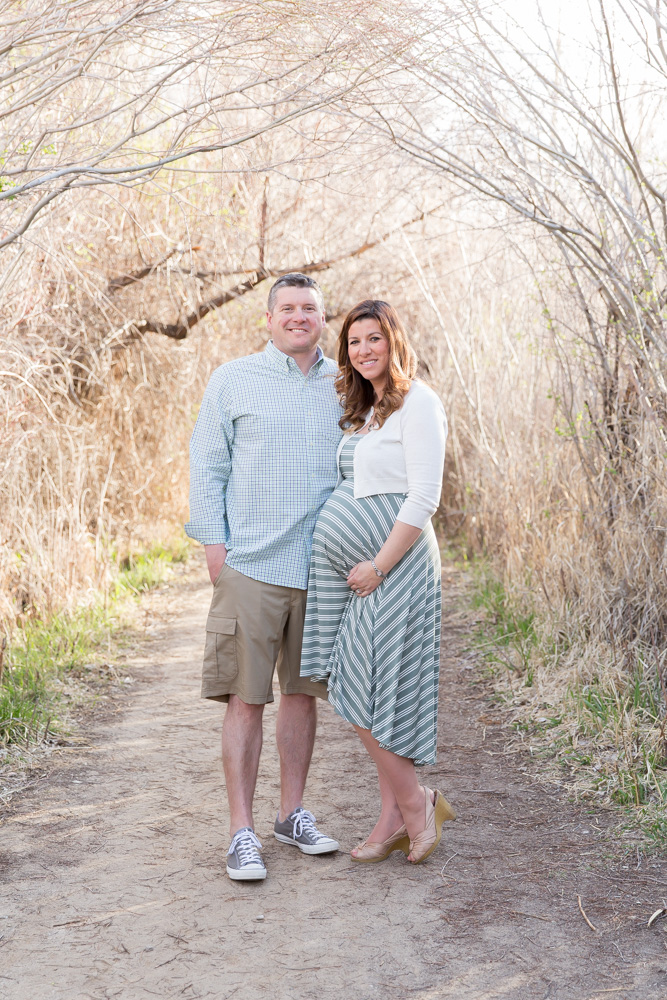 Mom and dad to be are proud parents and show off baby belly for Reno Family and Maternity photo by Reno Maternity Photographer