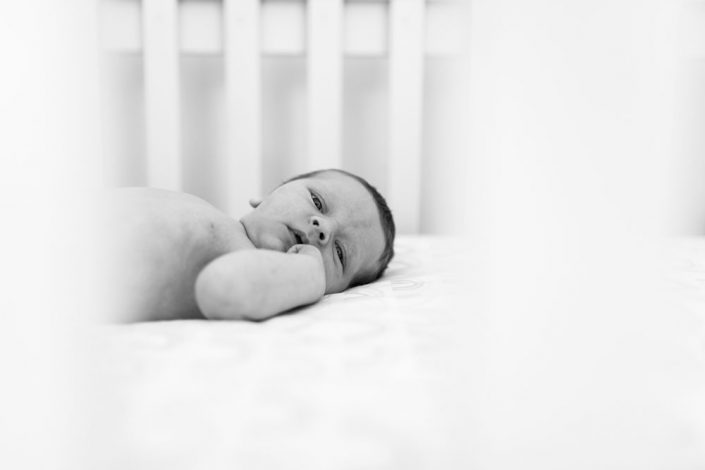 casual in home lifestyle newborn photos by Reno Newborn Photographer