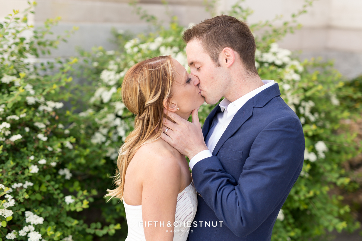 Bride and groom kiss during a Downtown Reno elopement by Reno Wedding Photographer