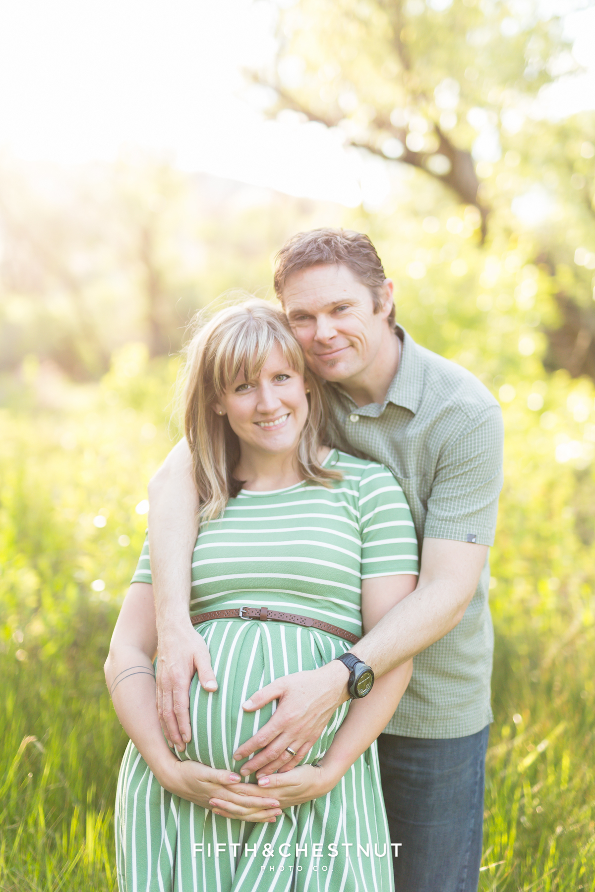 Lovely spring portrait of mom and dad expecting third baby for their maternity photography in reno