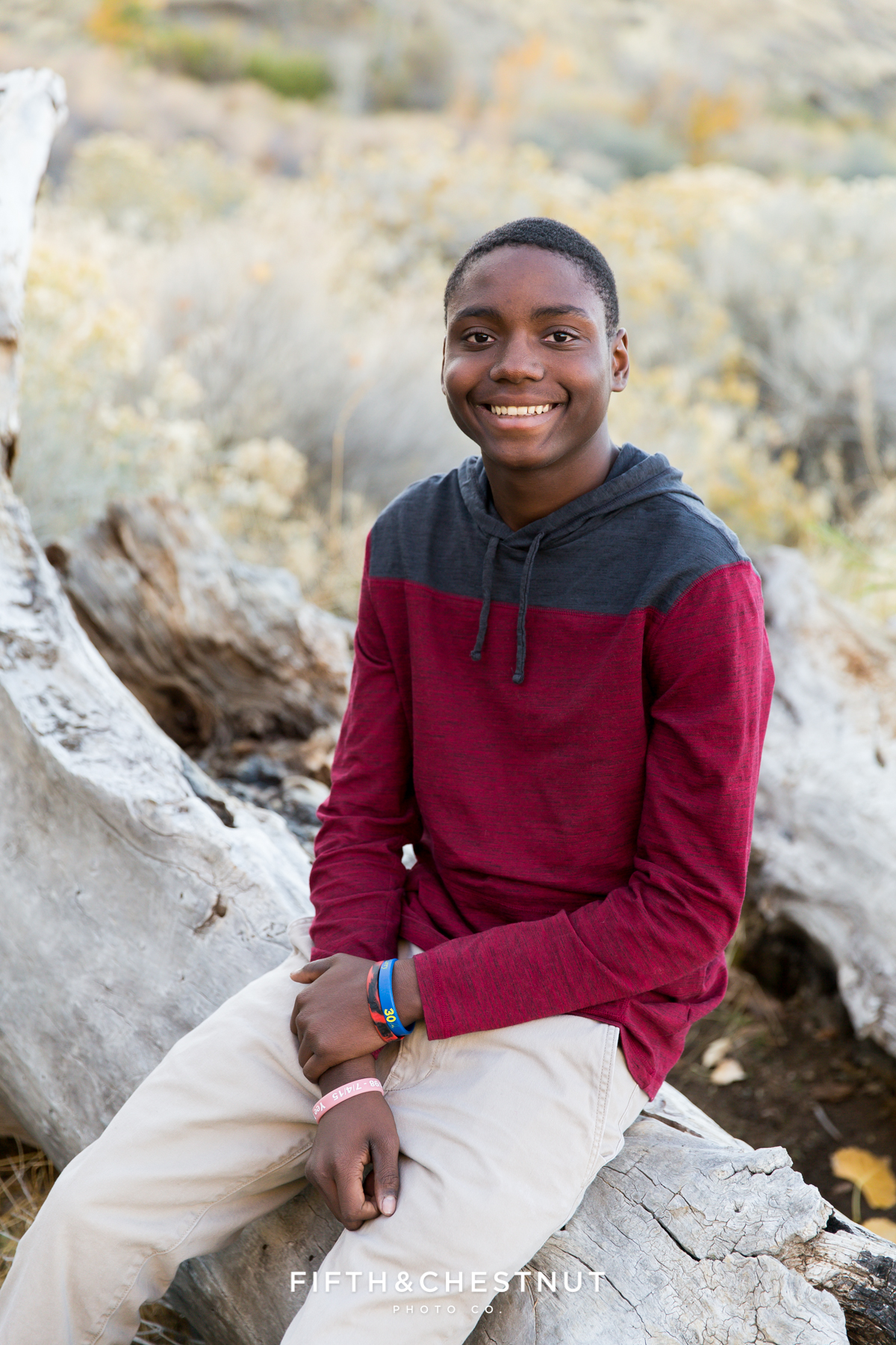 Fall family portraits of a young man at Mayberry Park in Reno by Reno Family Photographer