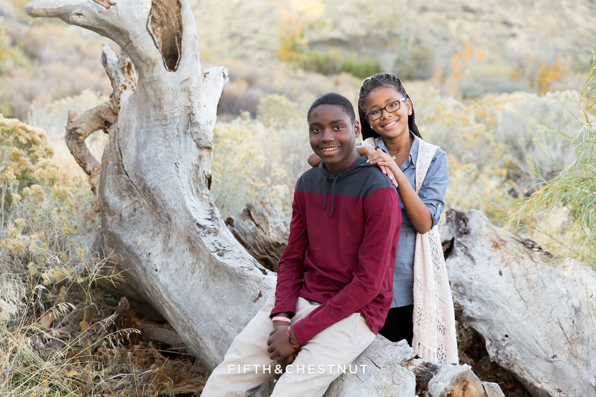 Cute fall family portrait of siblings at Mayberry Park in Reno by Reno Family Photographer