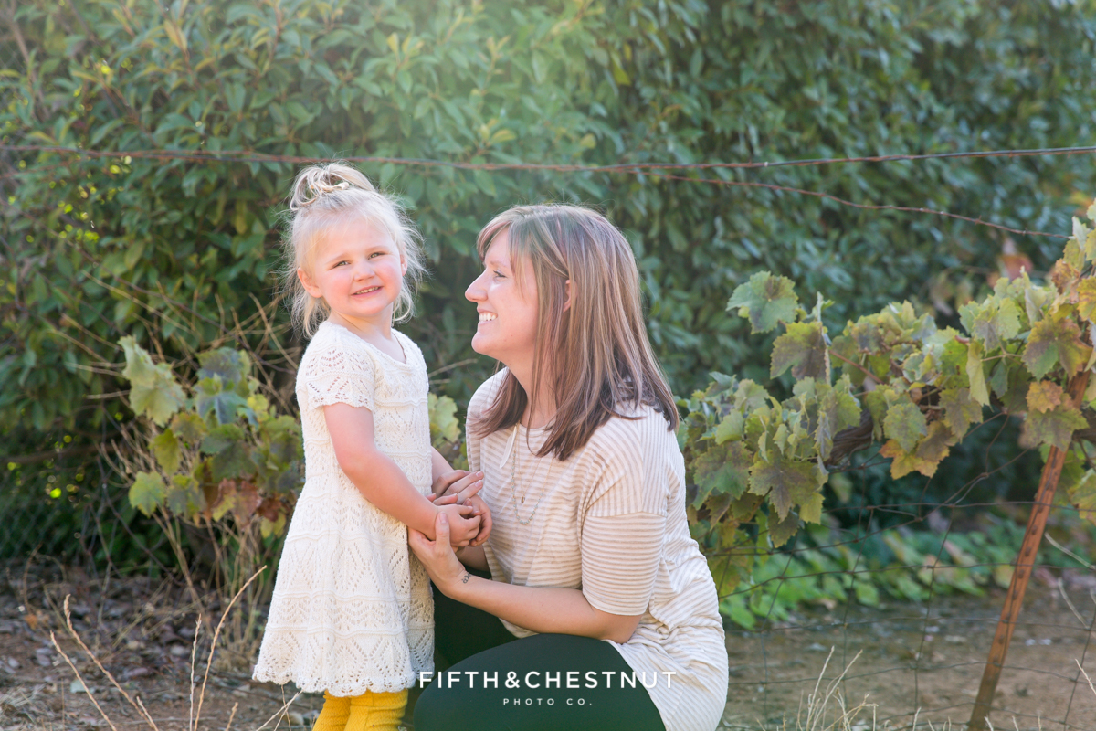 Portrait of Mom and daughter in an apple orchard by Reno Family Photographer