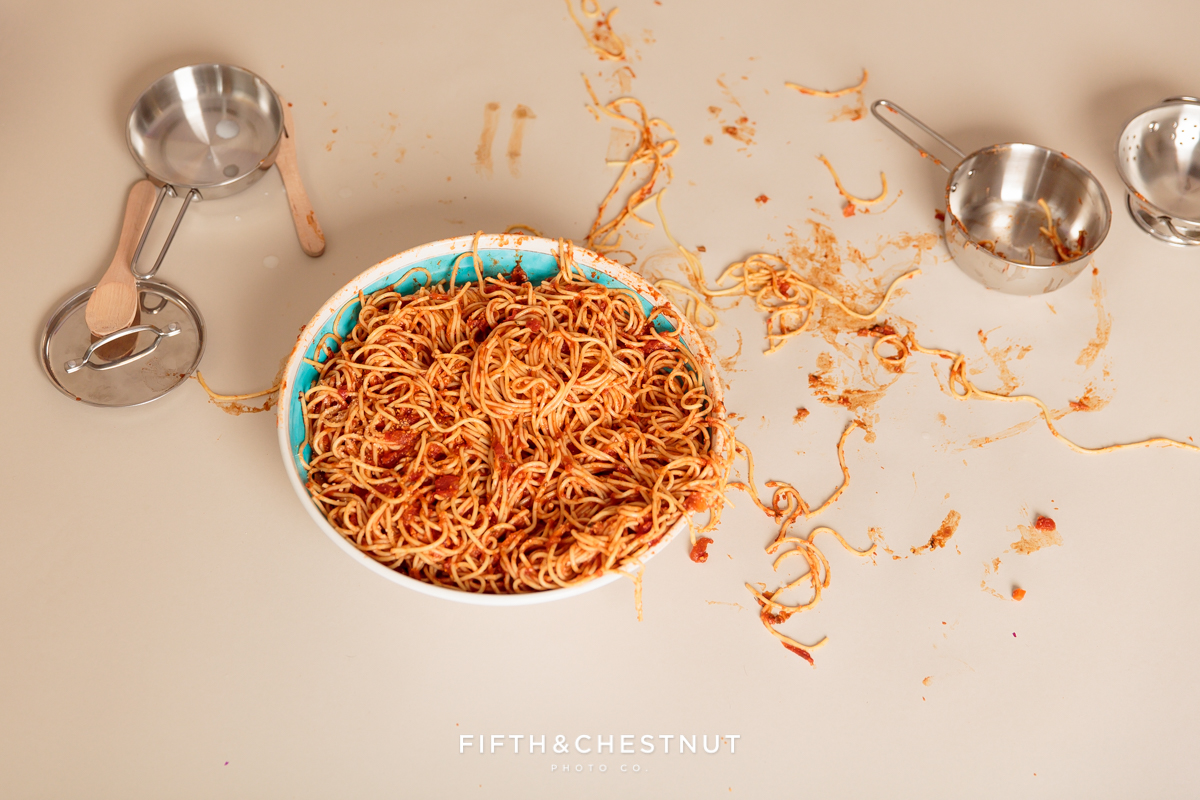 behind the scenes detail photo of spaghetti mess