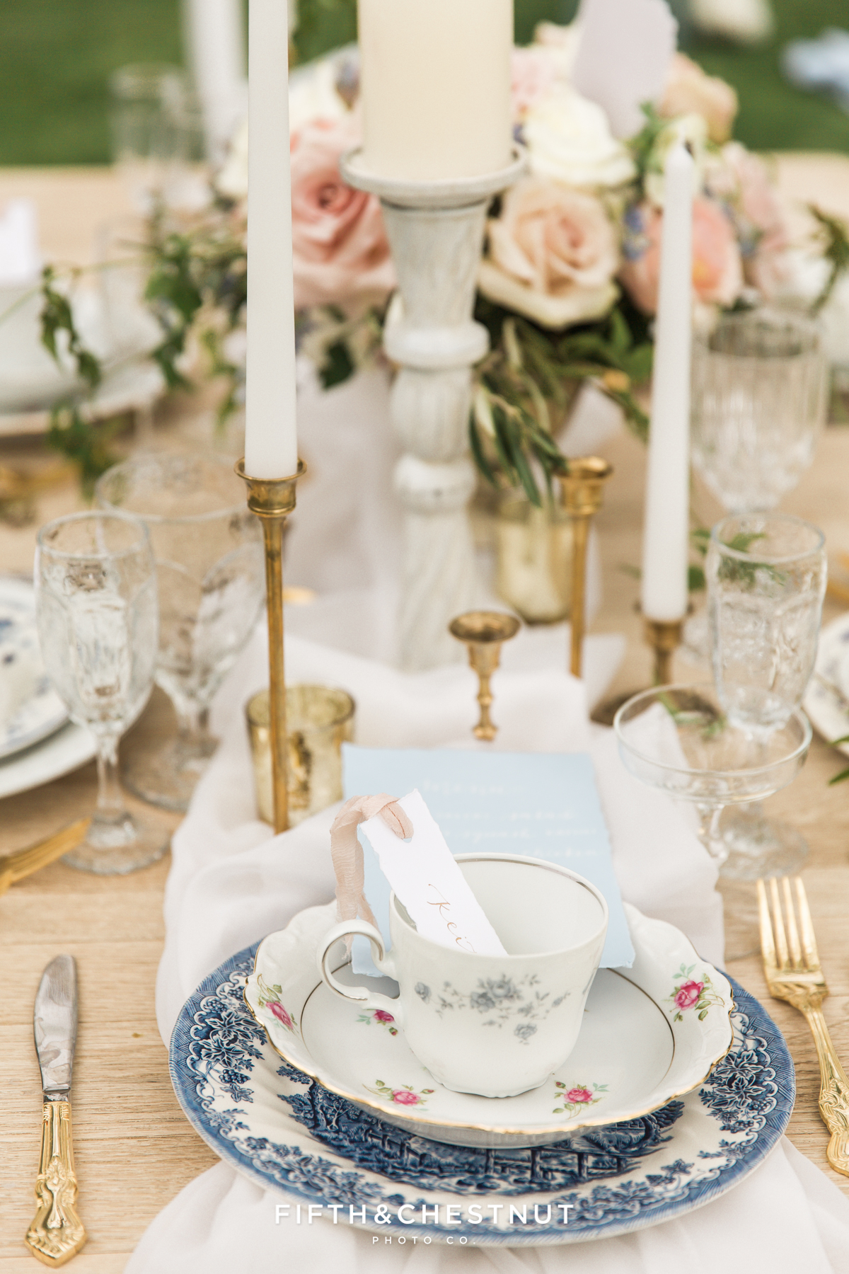 Place setting details with mismatched gold edged plates for a Dusty Blue Private Estate Country French Wedding Styled Shoot