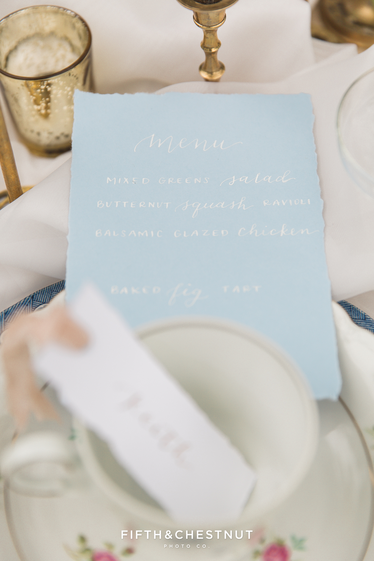 Dusty blue wedding dinner menu with custom calligraphy for a Dusty Blue Private Estate Country French Wedding Styled Shoot