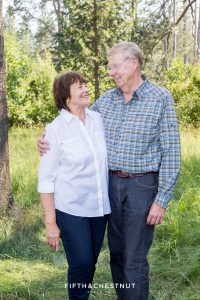 grandparents smile at one another for truckee family portraits in tahoe donner area