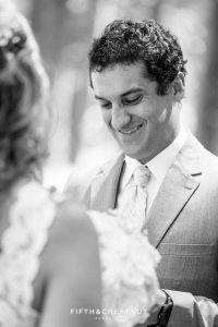 Groom reads a handwritten note from his Bride after their first look before their North Lake Tahoe Wedding