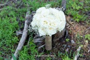 Closeup of rose wedding bouquet before a Tahoe wedding