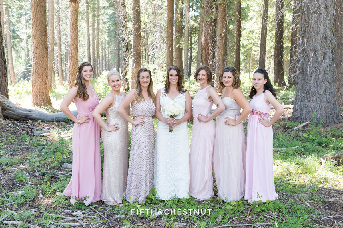 Bride poses with her bridesmaids in pink for her North Lake Tahoe Wedding