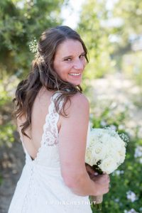 Bride shows off her lovely custom wedding gown made in Ecuador for her North Lake Tahoe Wedding by Tahoe Photographer