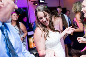Bride dancing during her North Tahoe Event Center Wedding