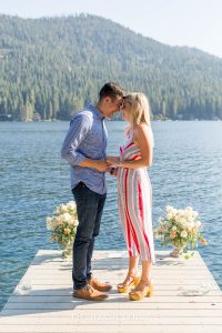 Bride and groom to be rest foreheads together after a Donner Lake Proposal