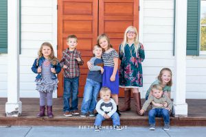 seven grandchildren pose for Bartley Ranch Portraits by Reno family photographer