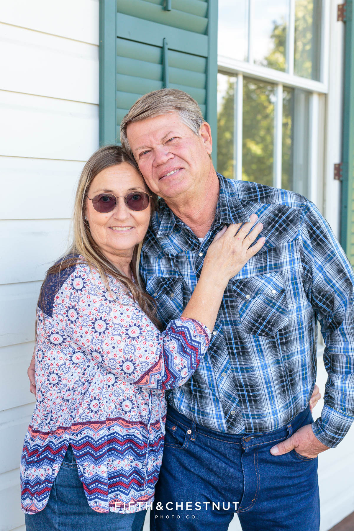 husband and wife (and grandparents of seven grandchildren) pose for Bartley Ranch Portraits by Reno Family Photographer