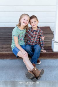 a boy and girl pose for Bartley Ranch Portraits by Reno Family Photographer