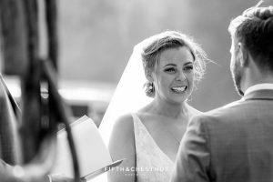 bride cries tears of joy at her Greenhorn Creek Guest Ranch Wedding ceremony