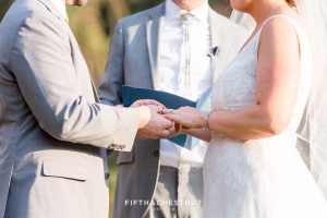 exchange of rings at a Greenhorn Creek Guest Ranch Wedding