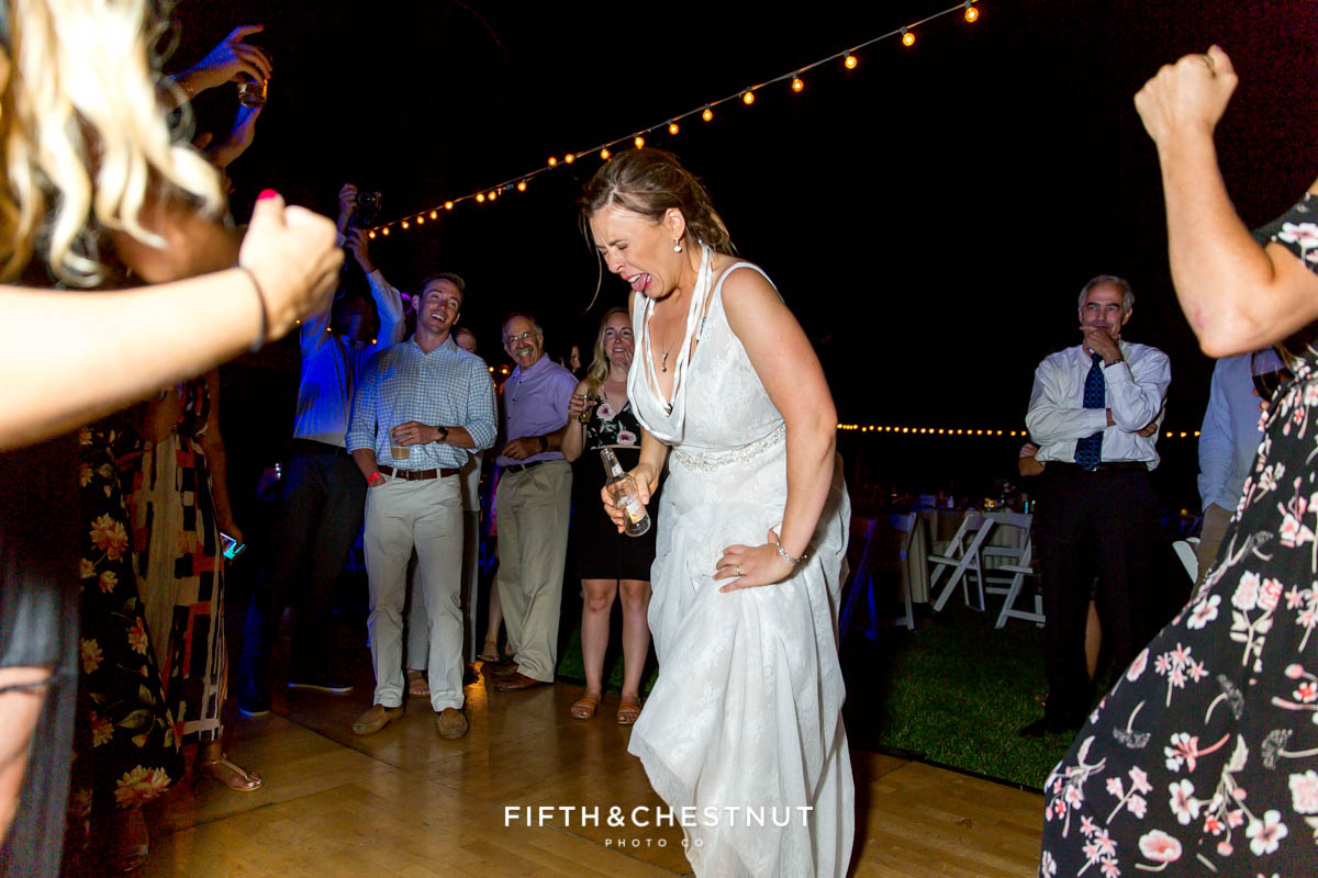 bride makes sour face after chugging a whole smirnoff ice in less than a minute at her Greenhorn Creek Guest Ranch Wedding