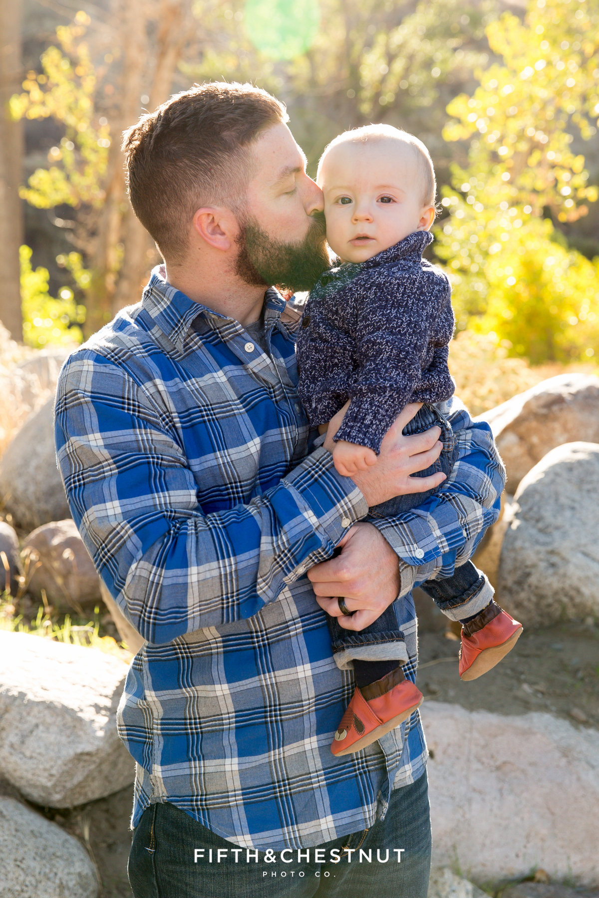 Father kisse his son's cheek for Mayberry Park Portraits