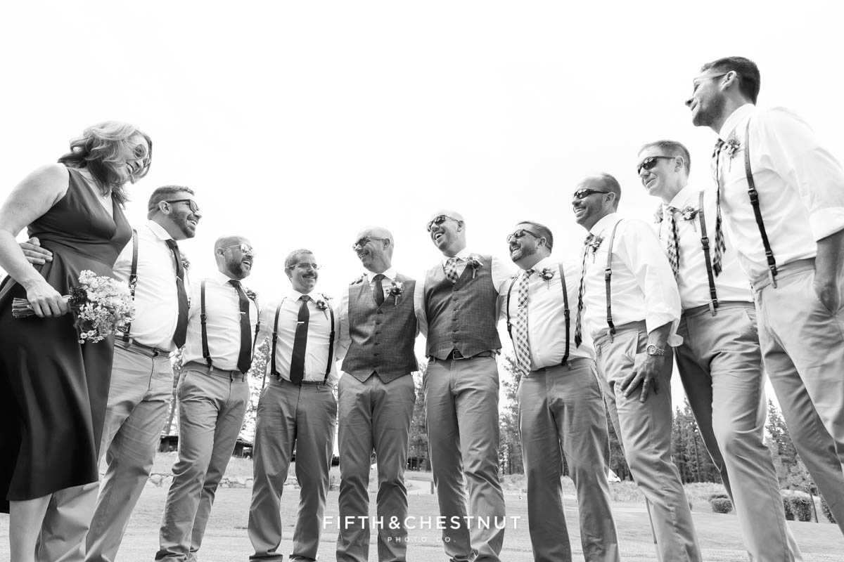Wedding party laughs and smiles as clouds hang overhead before a PJ's at Gray's Crossing wedding