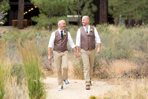 Grooms walk down the aisle together for their PJ's at Gray's Crossing wedding