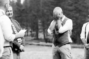 Groom hides his tears during wedding ceremony at a Truckee Wedding at PJ’s at Gray’s Crossing