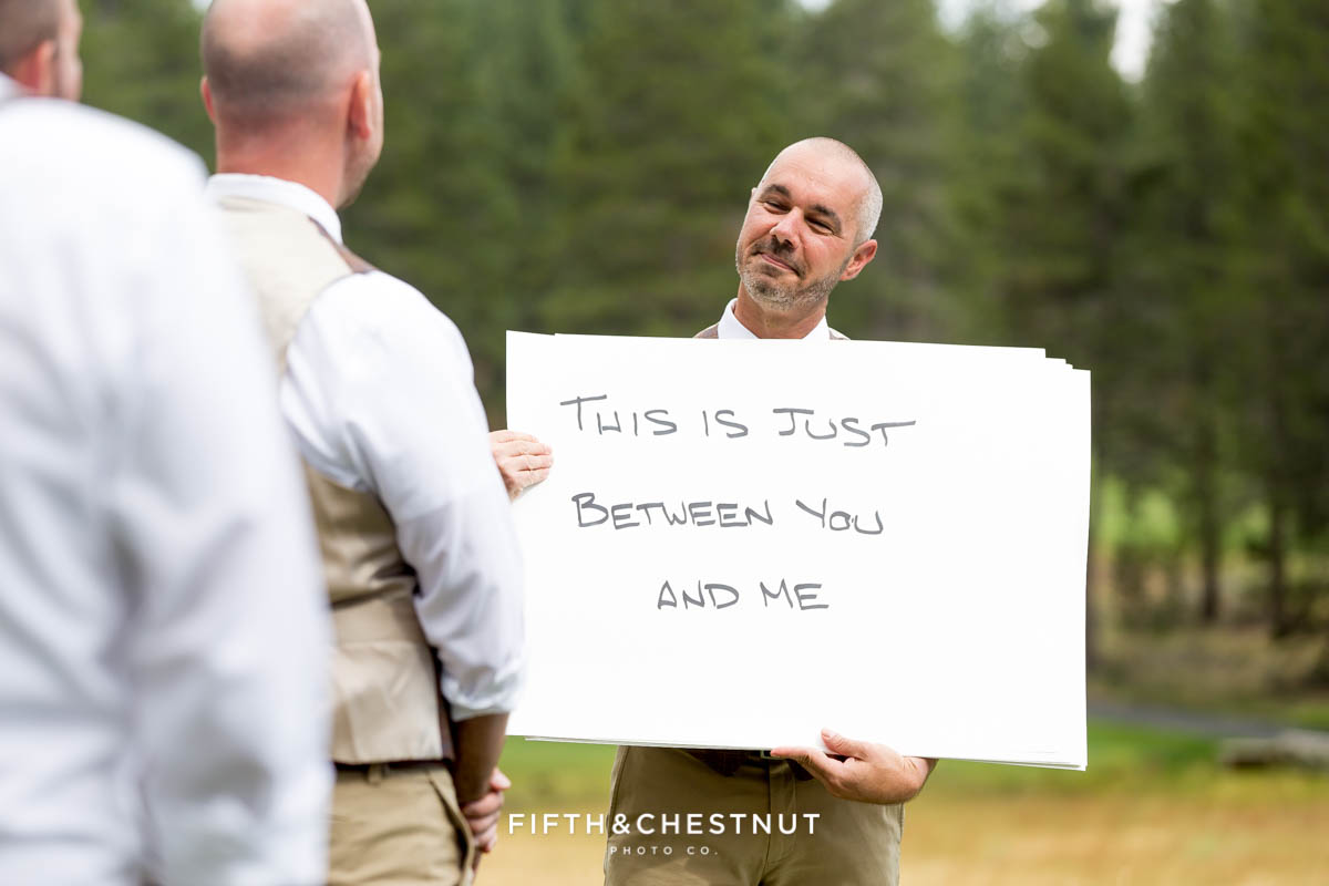 Groom uses cue cards to tell his vows at a PJ's at Gray's Crossing same-sex wedding
