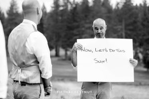 Groom uses cue cards to tell his vows at a PJ's at Gray's Crossing same-sex wedding