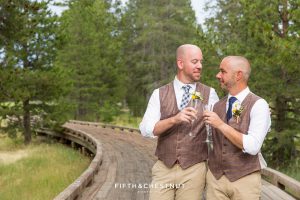 Grooms drink champagne in celebration of their gay wedding at PJ’s at Gray’s Crossing in Truckee