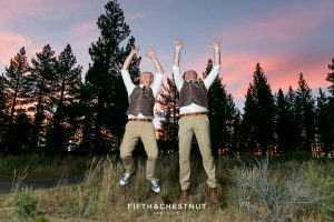 Grooms jump for joy during sunset at their PJ's at Gray's Crossing wedding