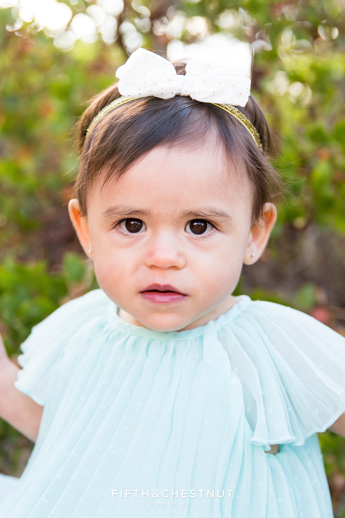 closeup of one year old girl for her fashionable one year portraits by Reno child photographer