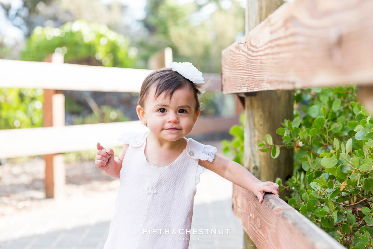 fashionable one year portraits by Reno child photographer of one year old girl in Lake Tahoe
