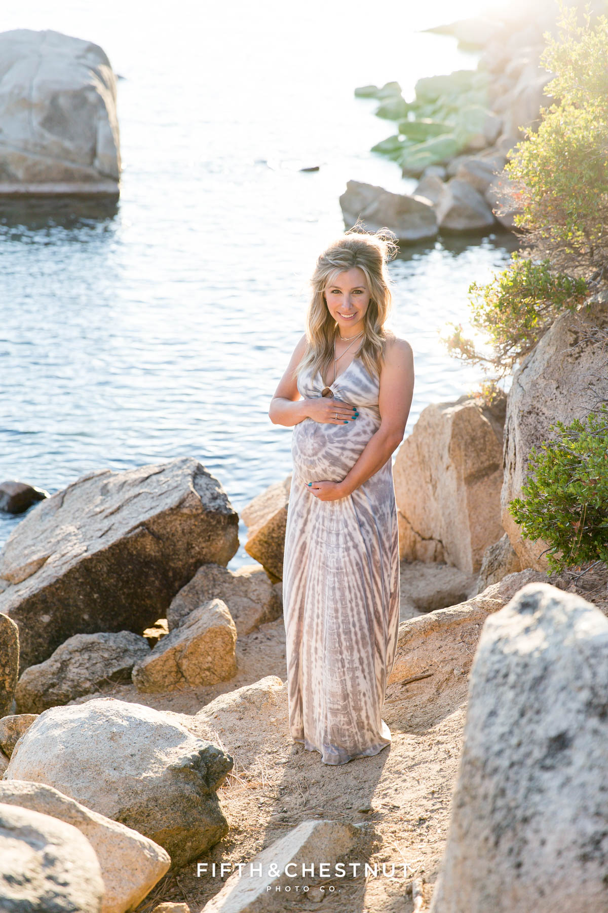 beautiful mama holds her pregnant belly for Tahoe Maternity Portraits