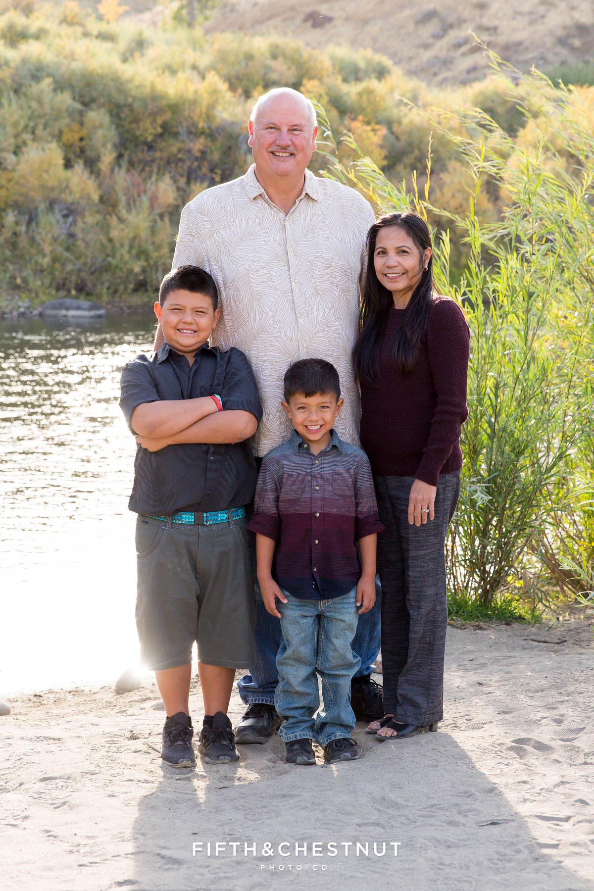 vibrant fall  portraits at Mayberry Park in front of truckee river