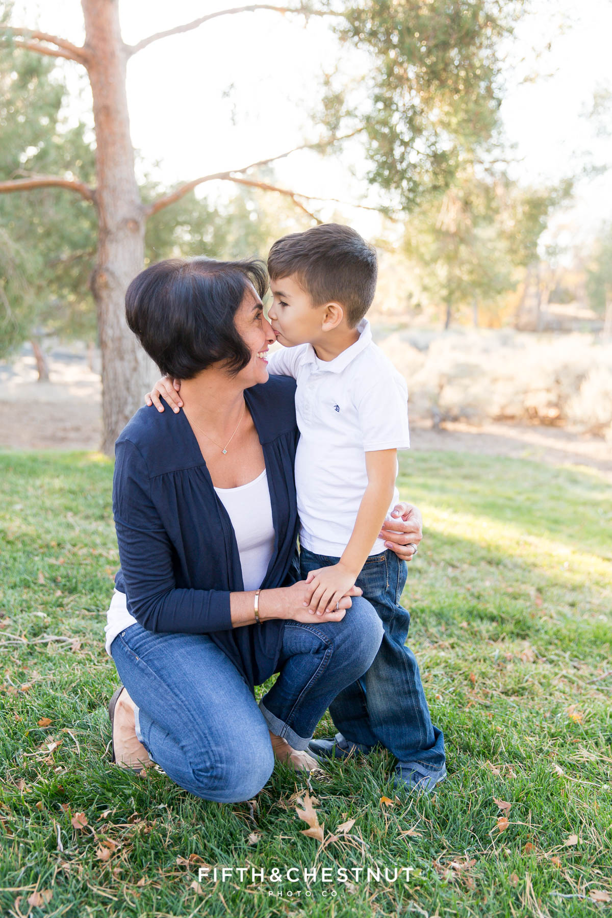 Son kisses his mom's nose for Caughlin Ranch Family Portraits