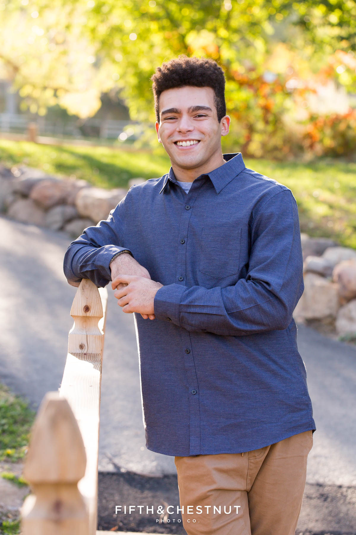 19 year old son poses for his fall family portraits at Caughlin Ranch by Reno Family Photographer