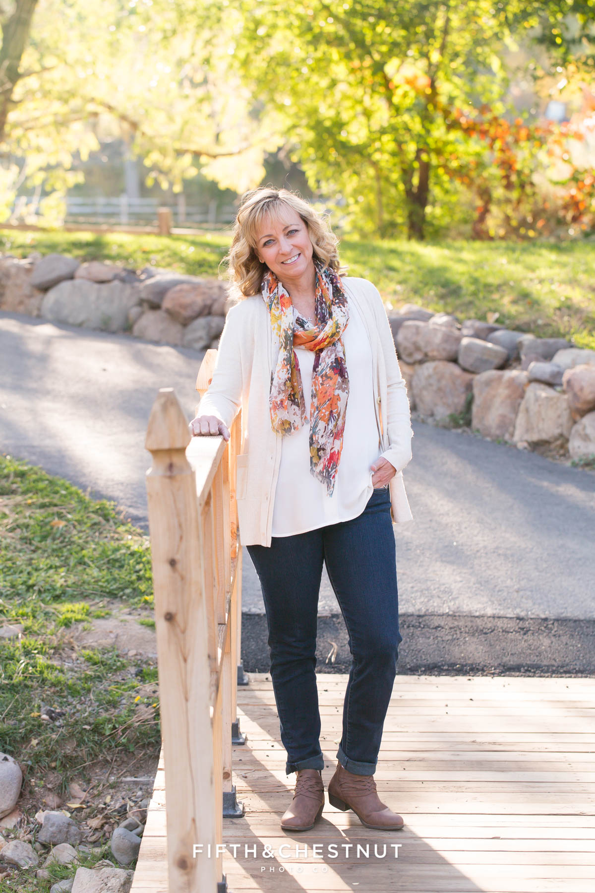 Mom poses for her fall family portraits at Caughlin Ranch