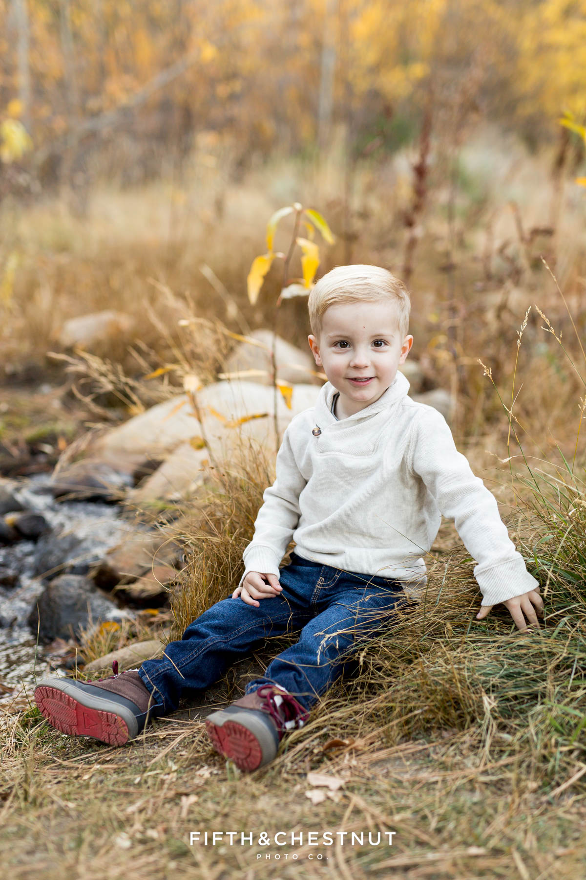 Portrait of 2 year old boy during his Fall Galena Creek Portraits by Reno Family Photographer