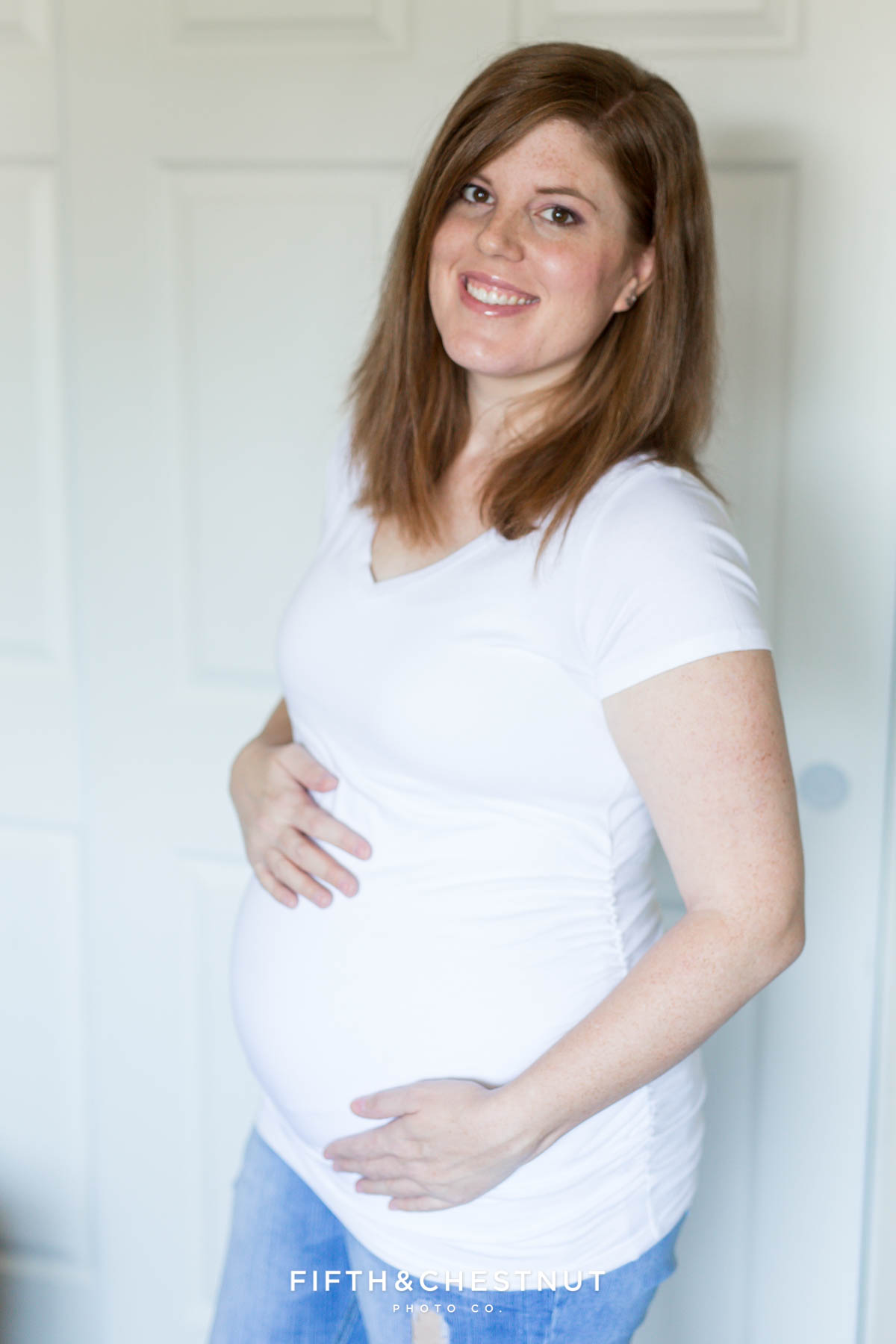 Reno family photographer at 14 weeks pregnant with twins wearing white