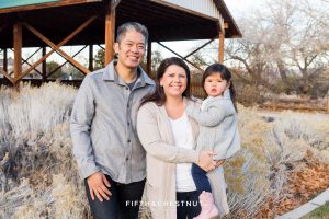 Adorable Reno Family Portraits of family in front of Bartley Ranch covered bridge in Reno