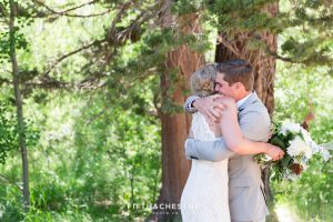 bride and groom embracing after first look for a zephyr cove wedding by lake tahoe wedding photographer