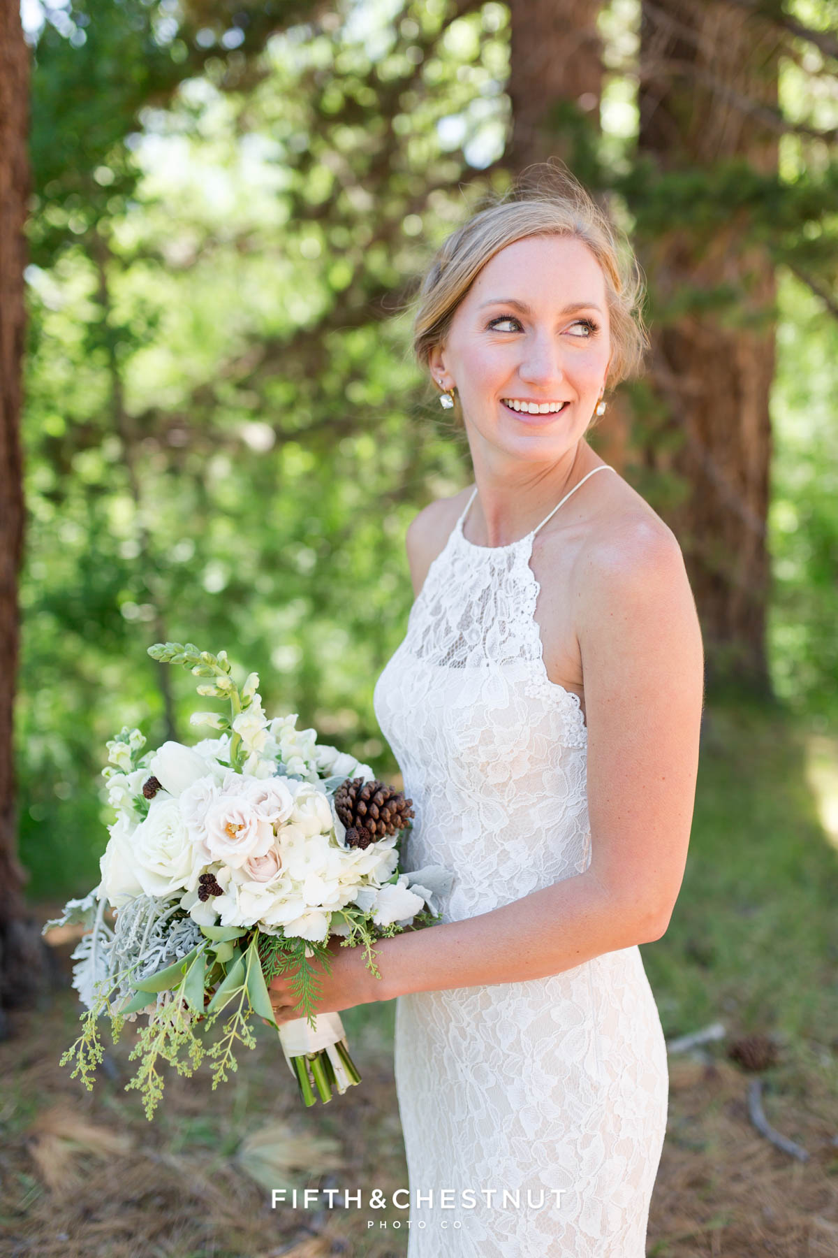 bride looks over her shoulder for a portrait before her zephyr cove wedding in Lake Tahoe
