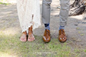bride and groom's feet before their lake tahoe wedding