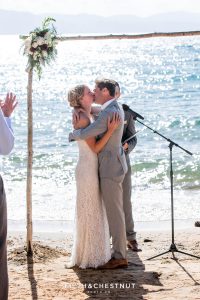 bride and groom become husband and wife and kiss at their lake tahoe wedding