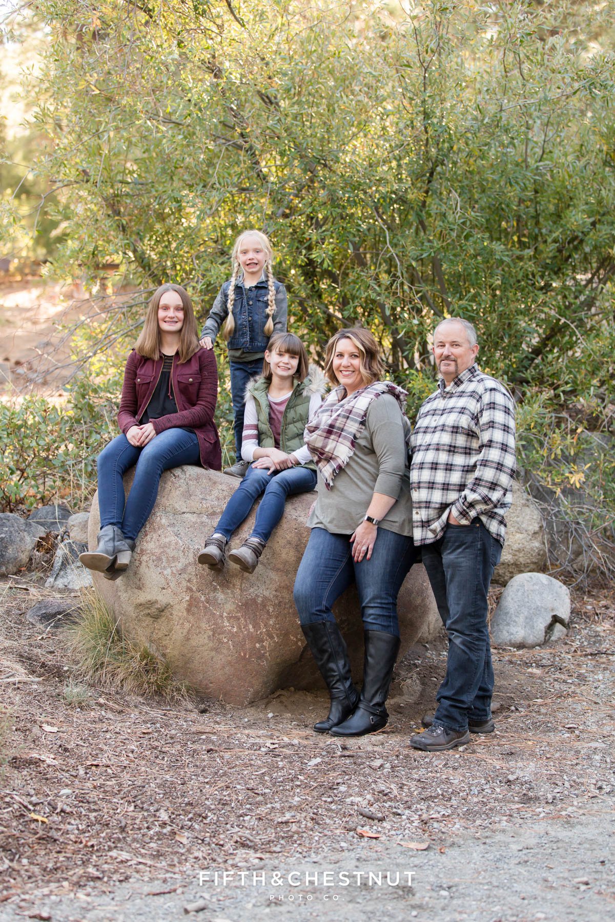 family poses at galena creek park in fall wardrobe for Galena Creek Reno fall portraits