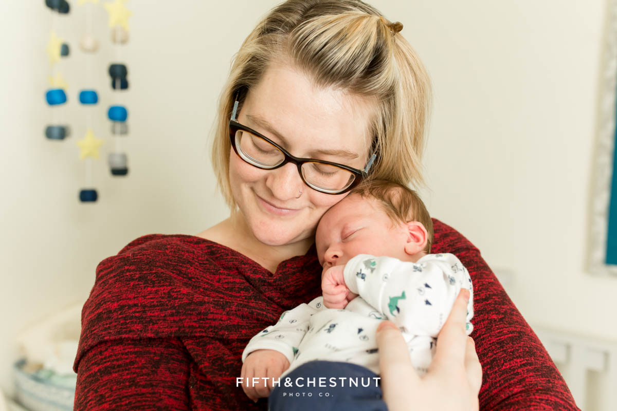 Casual In home lifestyle newborn photography by Reno Newborn Photographer on a fall afternoon